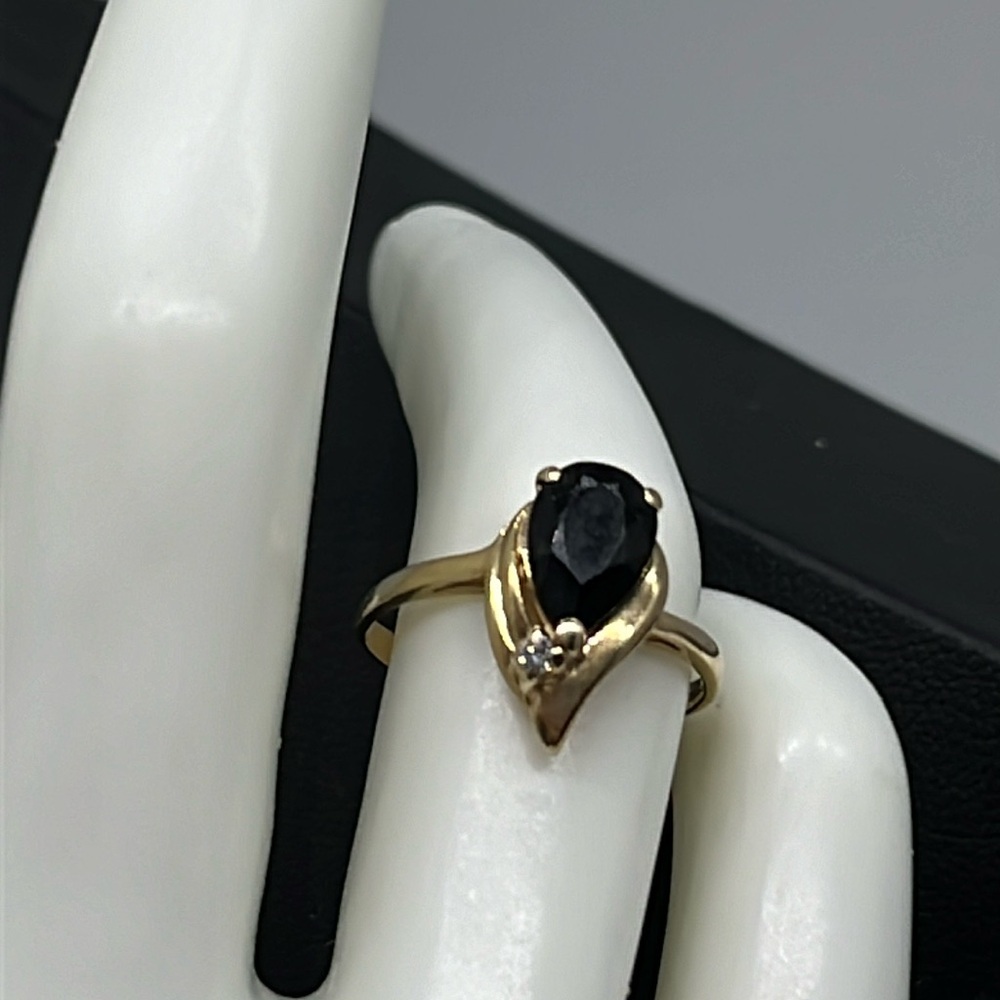 14k yellow gold diamond and black stone ring, size 6, tear drop shape